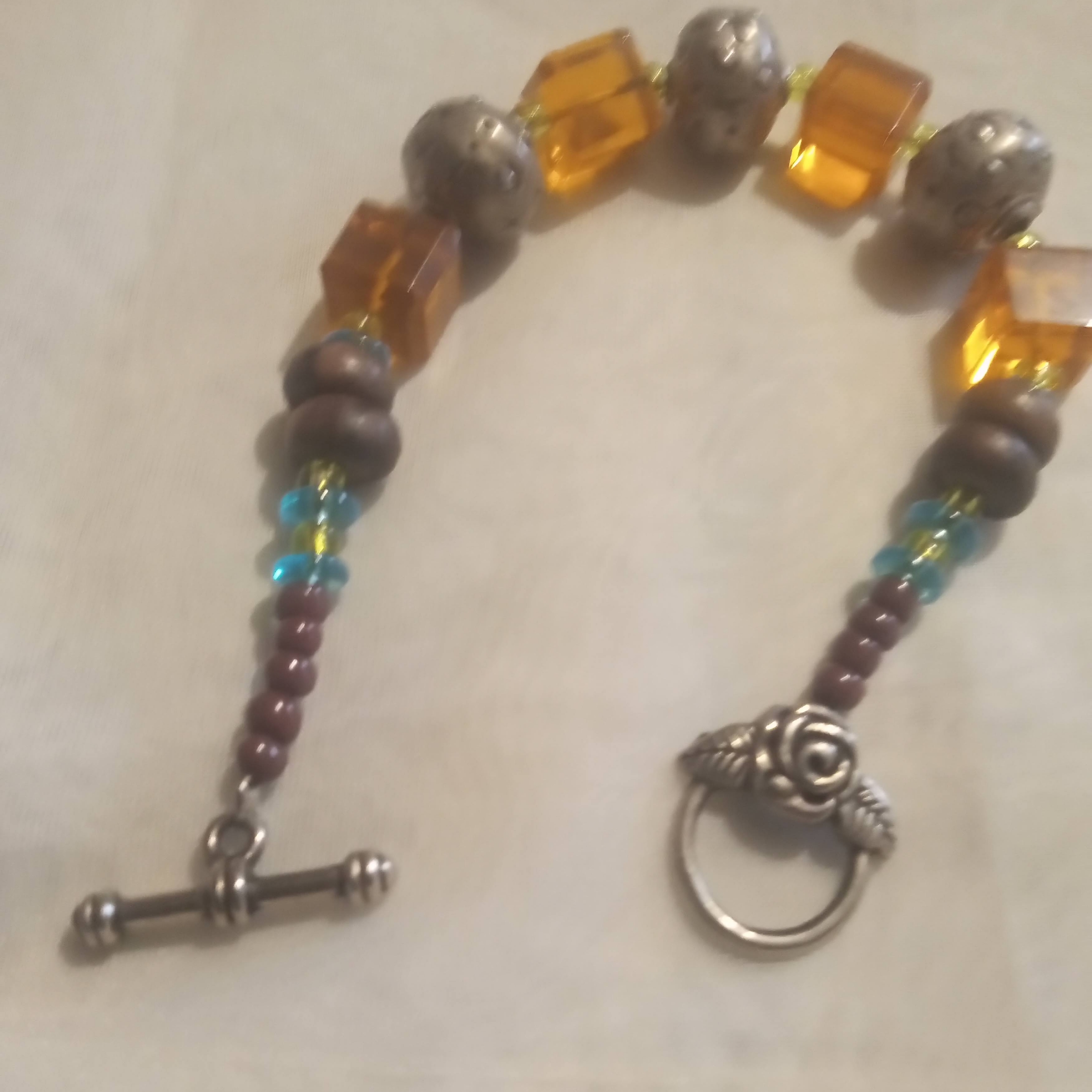 Beaded Bracelet With Amber And Silver Tones